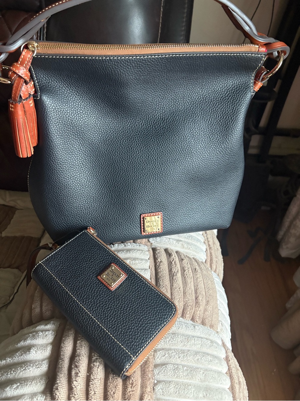 Dooney & Bourke Black Pebbled Leather Hobo with Brown Trim and Tassel